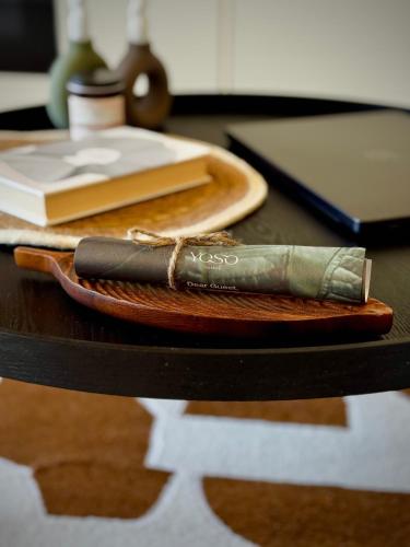 a knife sitting on top of a wooden table at YOSO Tenerife in Acantilado de los Gigantes