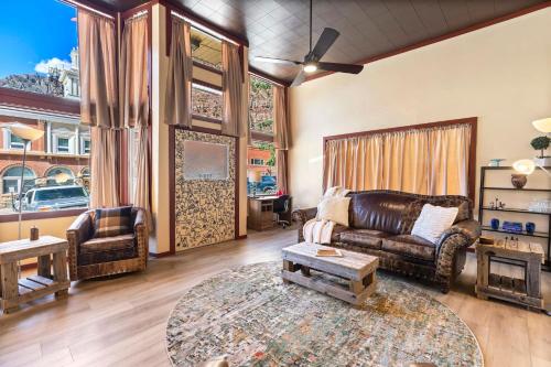 a living room with a couch and a table at 325 6th Ave Unit A in Ouray