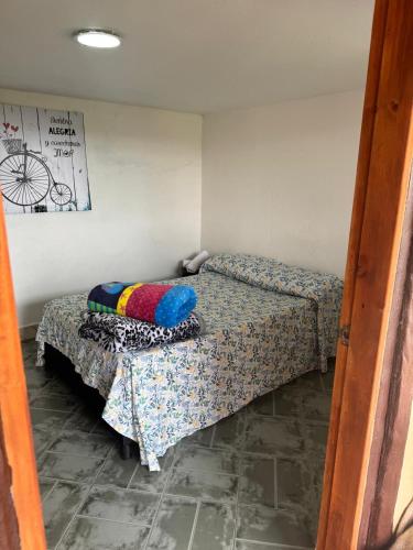 Ein Bett oder Betten in einem Zimmer der Unterkunft Hostal Inn II Rionegro