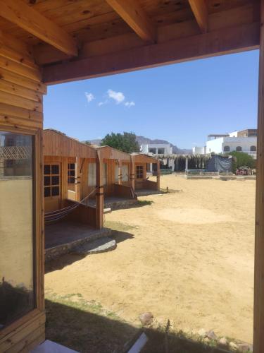 a view from the outside of a building with a large window at Mountain Sinai camp in Wāsiţ