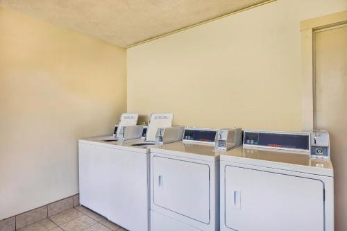 a row of washers and dryers in a room at Motel 6-Mount Jackson, VA - Shenandoah in Mount Jackson