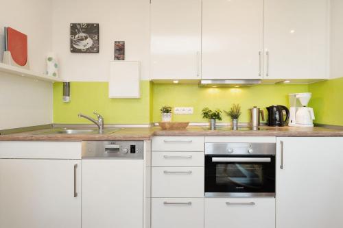 Kuchyň nebo kuchyňský kout v ubytování Seeschlösschen Wohnung 524