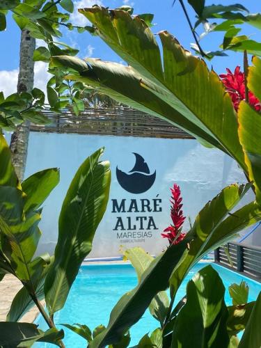 a sign for the marmite alma water preserve at Pousada Maré Alta - Maresias - 350mt da praia in Maresias