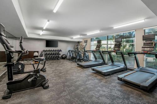 a fitness room with treadmills and cardio equipment at Fairfield Inn and Suites by Marriott San Jose Airport in San Jose