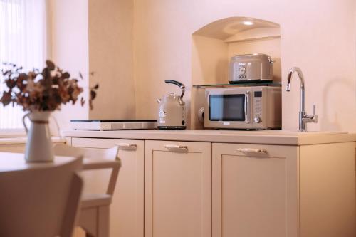 Apartmány Nathan - Ubytování s příběhemにあるキッチンまたは簡易キッチン