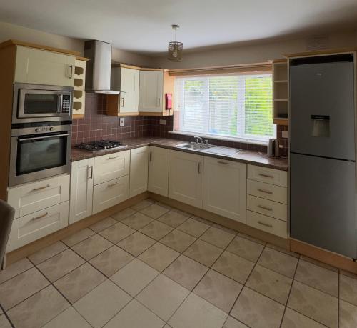 Kuchyň nebo kuchyňský kout v ubytování Serene Home