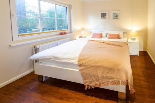 Postel nebo postele na pokoji v ubytování Key West 5- exklusive Wohnung mit Terrasse