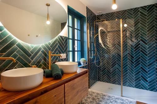 Ένα μπάνιο στο Ty Gouanac'h Maison de charme proche mer entièrement rénovée