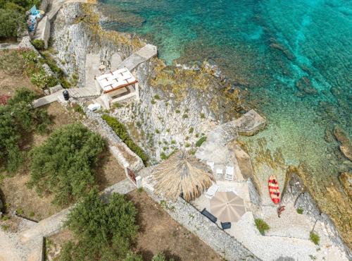 an aerial view of a resort with a water fountain at Stone House Blaca in Blato