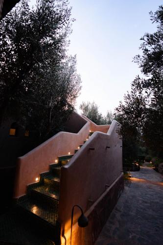 a set of stairs with lights on them at Olinto, Atlas Mountain Retreat - adults only in Ouirgane