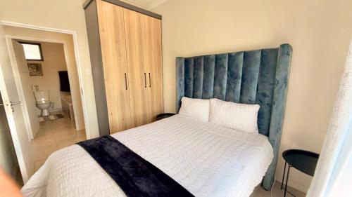 Ένα ή περισσότερα κρεβάτια σε δωμάτιο στο HeartWood Haven