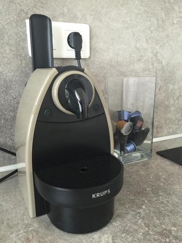 a kirps espresso machine sitting on a counter at Amazing View Port Golfe-Juan and Garage in Golfe-Juan