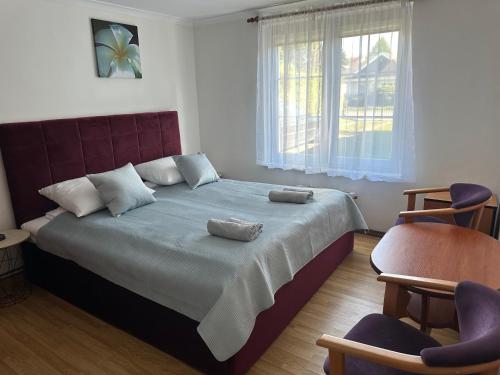 Postel nebo postele na pokoji v ubytování Blekitna Fala