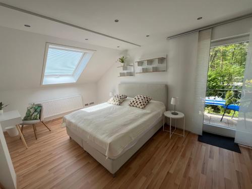 Ένα ή περισσότερα κρεβάτια σε δωμάτιο στο Messe- und Ferienloft am Nürnberger Reichswald