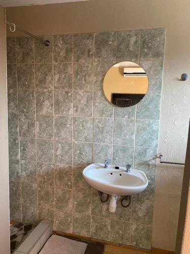 Ένα μπάνιο στο Satoka Guest House