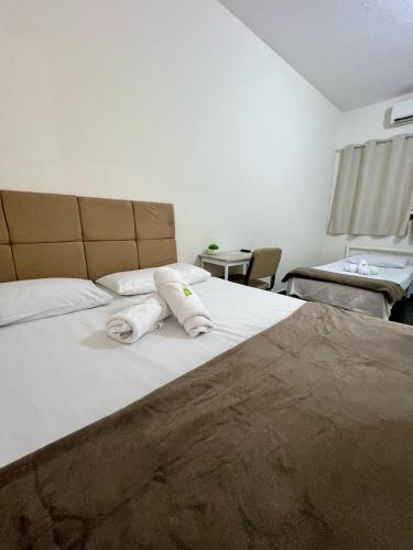 Postel nebo postele na pokoji v ubytování Art Hotel