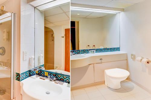 two pictures of a bathroom with a toilet and a sink at Belvilla Aberdeen Bridge of Don Exhibition Centre in Aberdeen