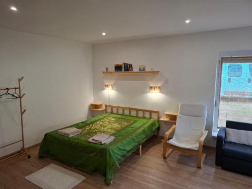 Postel nebo postele na pokoji v ubytování SB Sport Apartman
