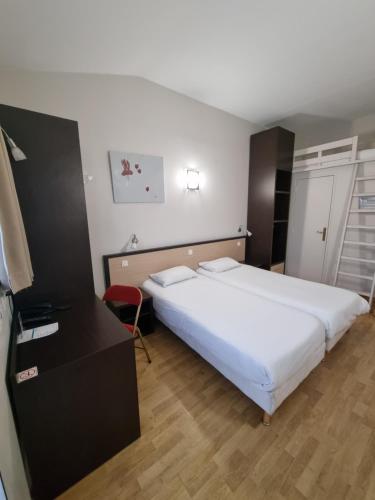 Ένα ή περισσότερα κρεβάτια σε δωμάτιο στο Allotel