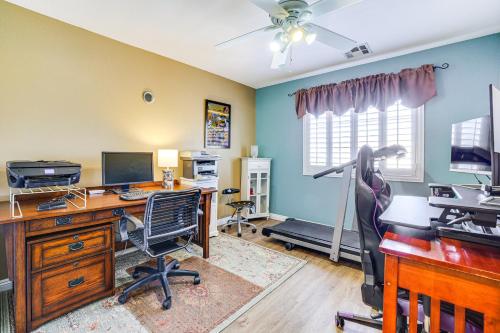 an office with a desk with a computer and a chair at Private Yard Las Vegas Sanctuary on Cul-De-Sac in Las Vegas