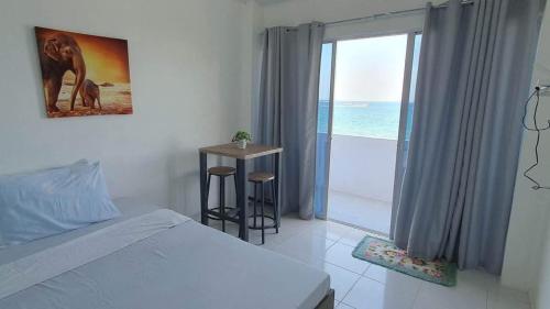 Katil atau katil-katil dalam bilik di GEN B Hotel