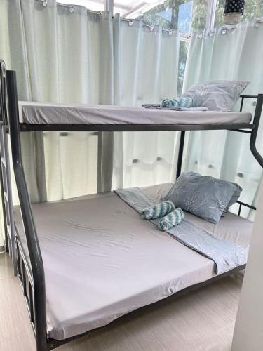 Katil atau katil-katil dalam bilik di GEN B Hotel