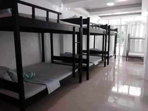 Katil atau katil-katil dalam bilik di GEN B Hotel