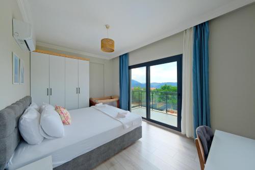 Postel nebo postele na pokoji v ubytování Villa Aromatherapy