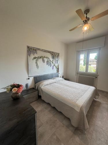 Un pat sau paturi într-o cameră la Villa Livia