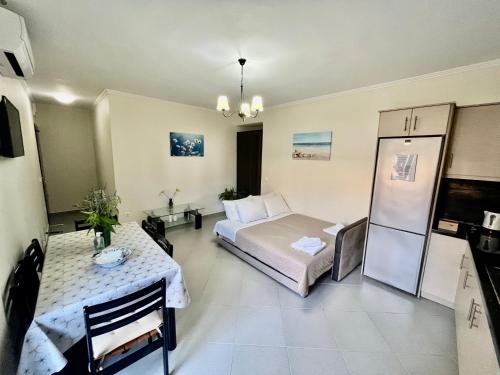 Ένα ή περισσότερα κρεβάτια σε δωμάτιο στο Emily Apartments