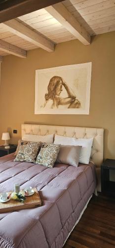 Postel nebo postele na pokoji v ubytování Le STELLE SULL'ARENA