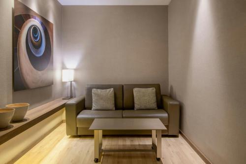 Χώρος καθιστικού στο AC Hotel La Finca by Marriott