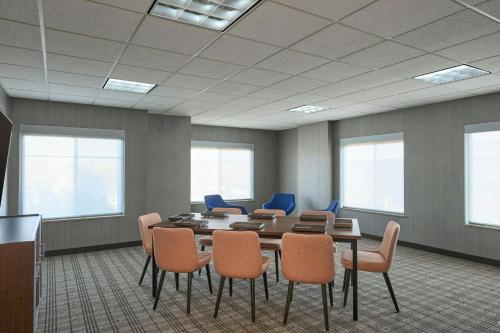 a conference room with a wooden table and chairs at Residence Inn Phoenix Desert View at Mayo Clinic in Phoenix