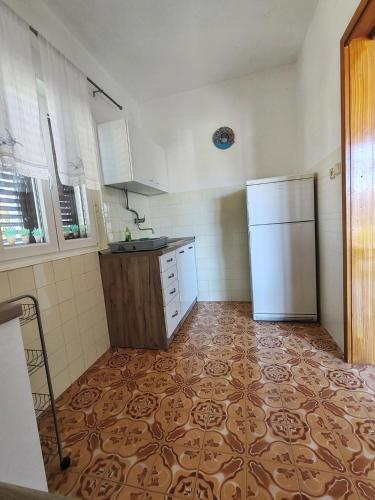 Una cocina o cocineta en Apartments Šimuni