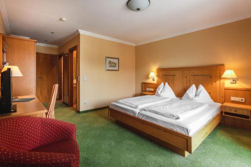Postel nebo postele na pokoji v ubytování Hotel Seerose