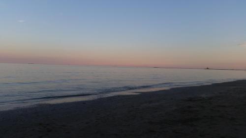 a beach with the ocean in the background at Eureka Azienda Agrituristica in Cavallino-Treporti