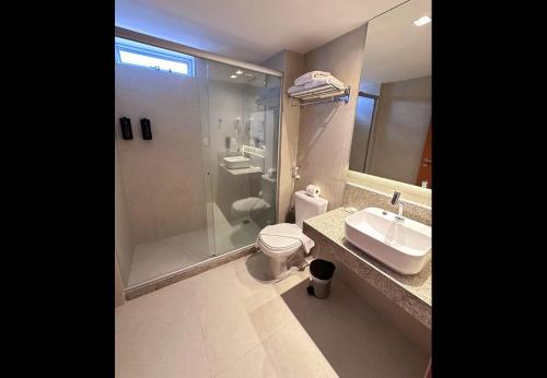 Um banheiro em Hotel Caiçara João Pessoa