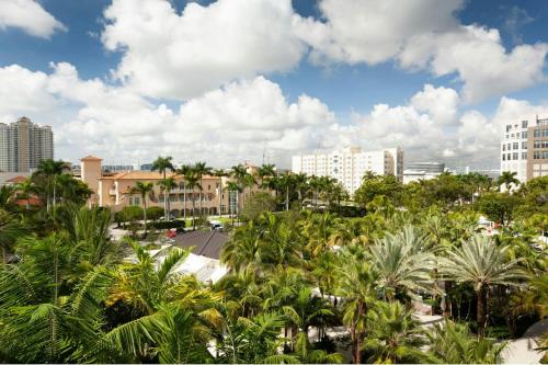 a view of a city with palm trees and buildings at JW Marriott Miami Turnberry Resort & Spa in Aventura