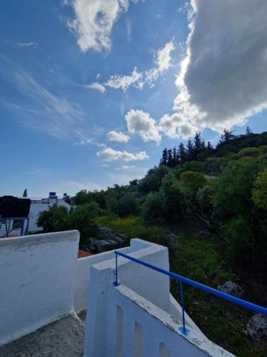 a view from the balcony of a house at Iliana's Bungalow in Arménoi