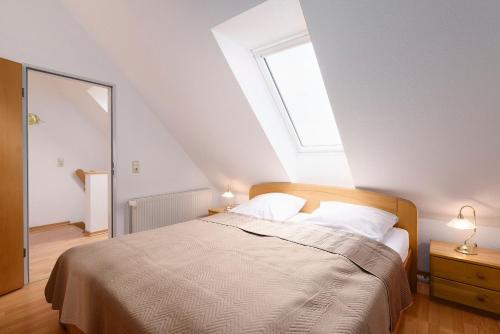 Ένα ή περισσότερα κρεβάτια σε δωμάτιο στο Wohnung 3