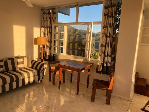 Χώρος καθιστικού στο The Apartment at Tranquility Estate