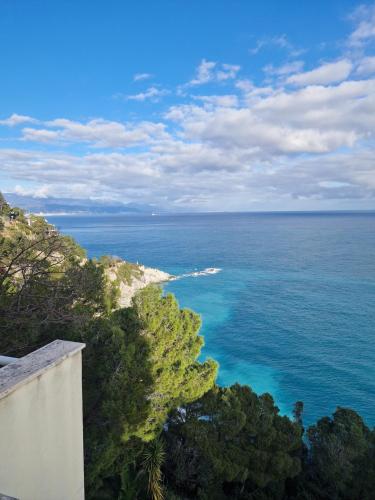 a view of the ocean from a building at Torre del Mare in Bergeggi