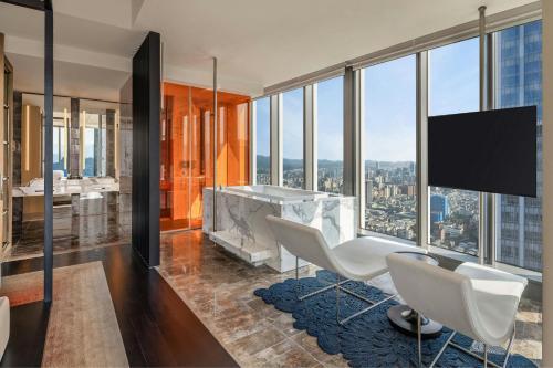 an office with a view of the city at W Taipei in Taipei