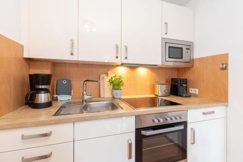 Køkken eller tekøkken på Seepark Wohnung 23