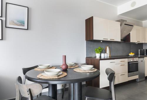 Kuchyň nebo kuchyňský kout v ubytování Apartamenty Olimpic