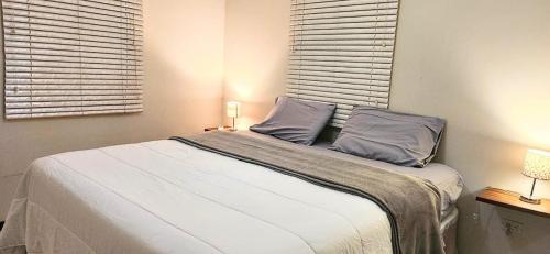Postel nebo postele na pokoji v ubytování Villa Exclusiva con Piscina privada a solo 10 minutos de Eagle Beach