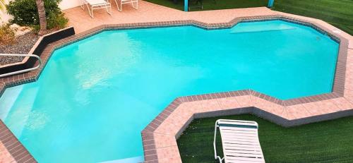 Bazén v ubytování Villa Exclusiva con Piscina privada a solo 10 minutos de Eagle Beach nebo v jeho okolí