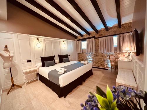 a bedroom with a large bed in a room at La Quinta Luxury Palace in Arnuero