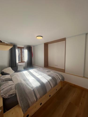 Postel nebo postele na pokoji v ubytování Appartement de 100m2 dans un chalet