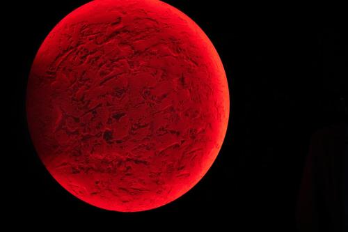 a close up of a red moon at CosmoDream in Mulhouse